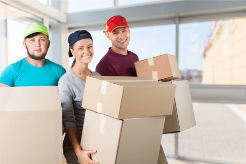 Professional team handling flat removals in a Becontreeheath apartment block